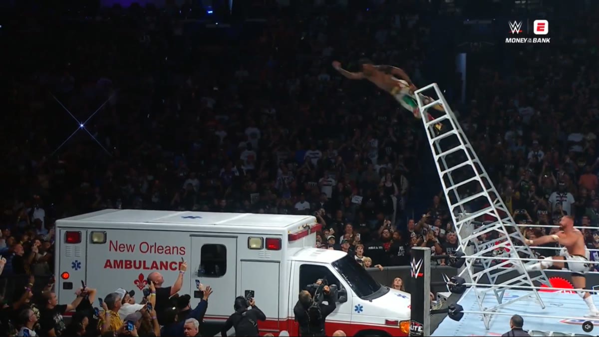 Je'Von Evans goes through an ambulance roof in the Money in the Bank ladder match